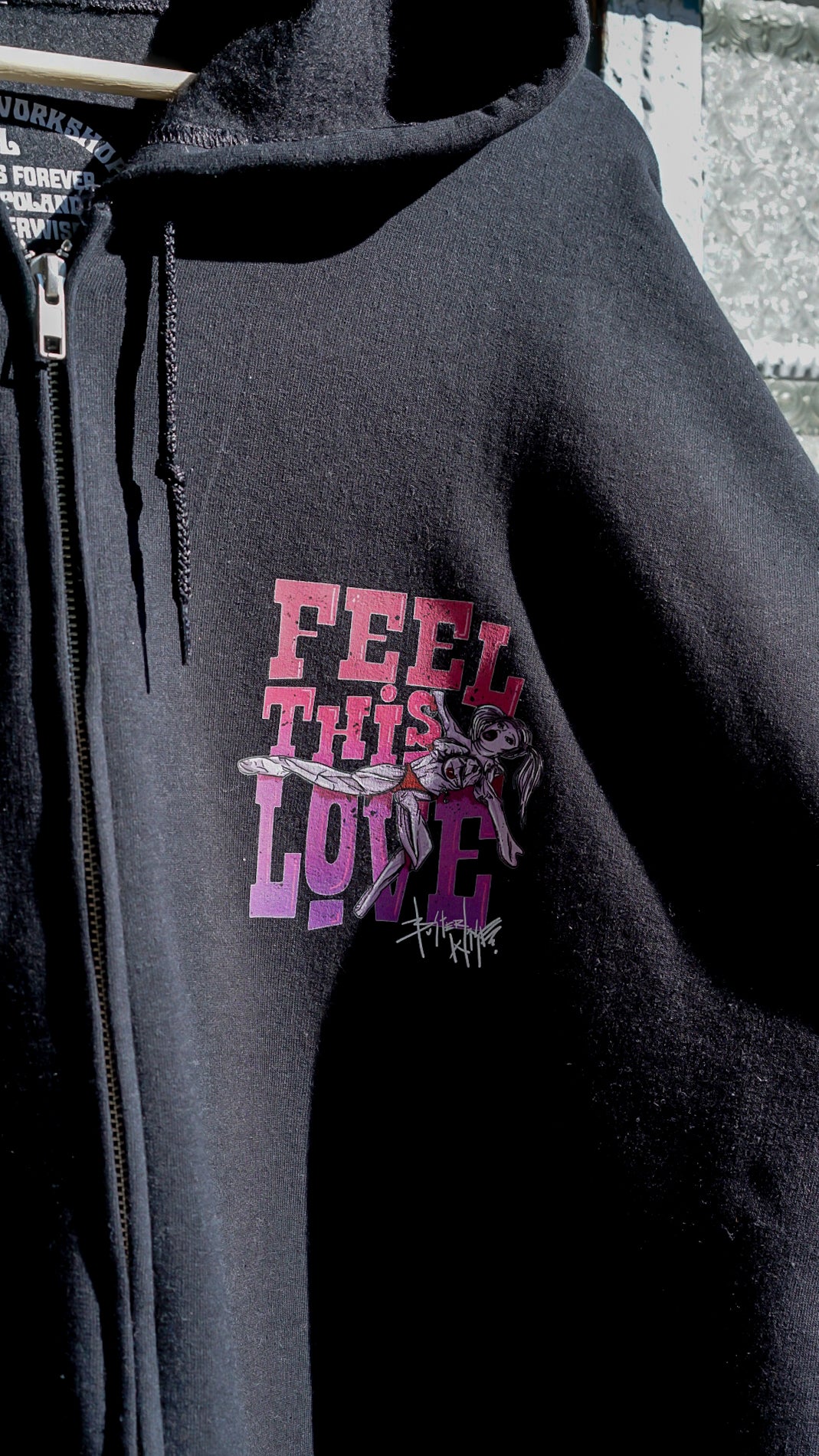 Sudadera con capucha y cremallera Feel the Love